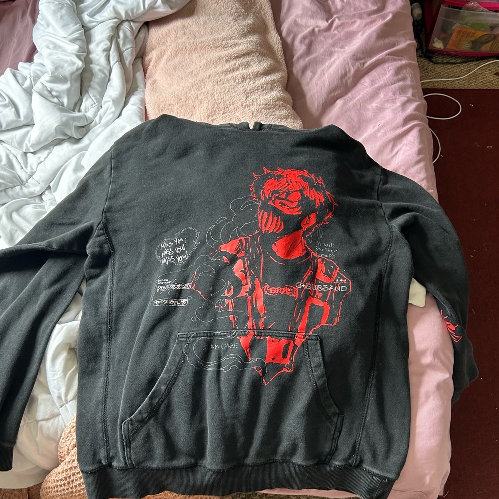 A large corpse husband hoodie. It runs small.